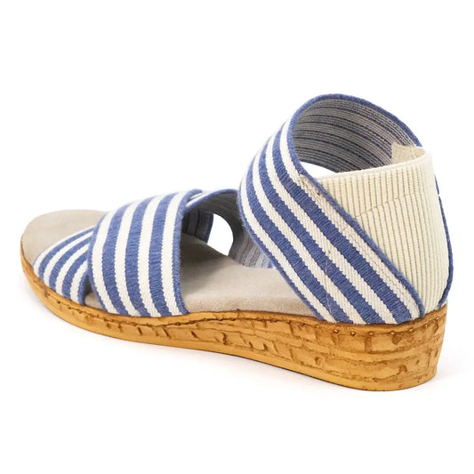 Blue and white stripe wedge sandals with cushioned beige insole, cork heel, heel cup. Sizes: 6-10.