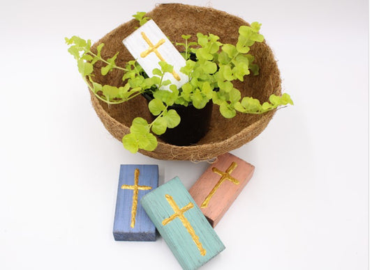 2” x 4” wood blocks with handpainted crosses in blue, green, pink, and white/gold. Available in multiple color options.
