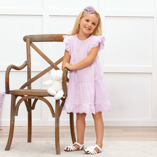 Lavender Eyelet Flutter Sleeve Gauze Dress with sandals and headband. Available in sizes 2T-8.