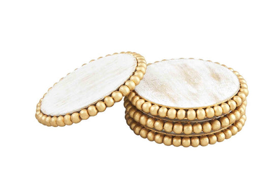 Round white marble coasters with gold beaded edges, 4" diameter, sold as a set.