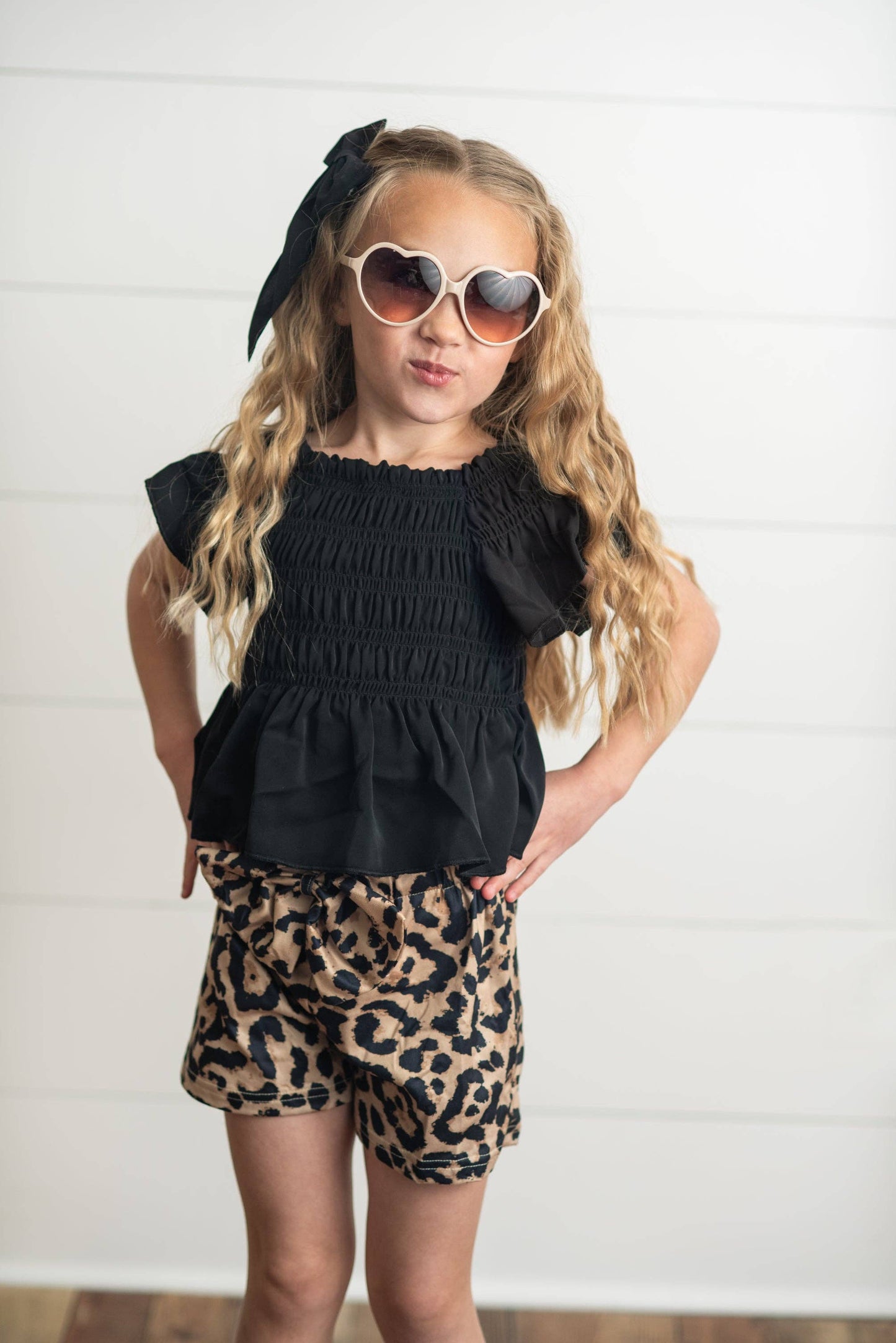 Girls Leopard Shirred Short Set in leopard print, shirred waist, available in sizes XS-XL.