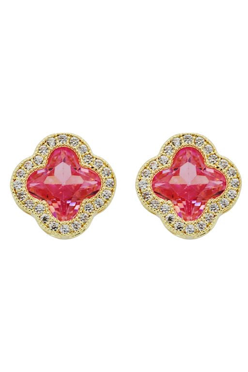 Gold-tone crystal earrings with a clover-shaped rose pink stone and clear crystal border. Available in one size.