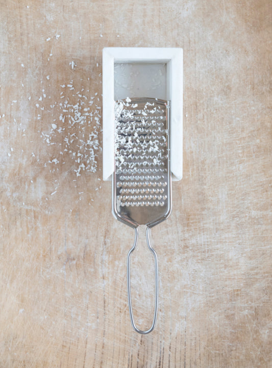 Marble and stainless steel handled grater. Sizes: Small, Medium, Large.