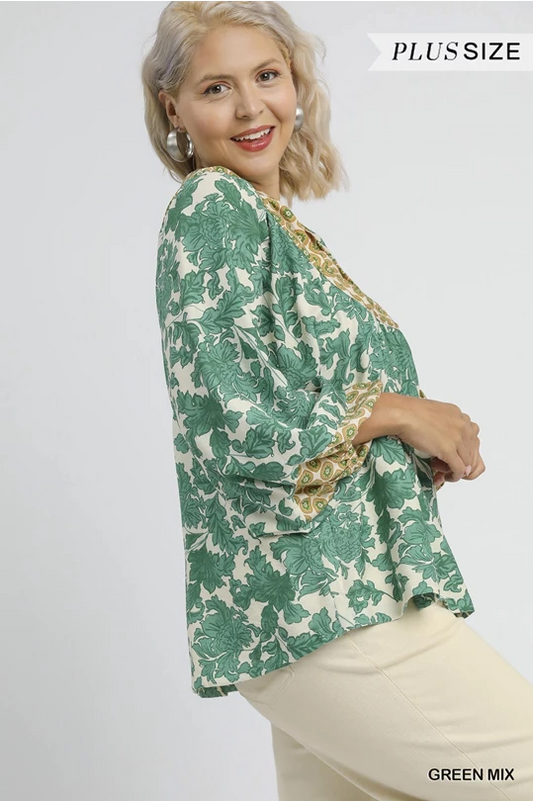 Annie Abstract Print Top in green and white floral with patterned trim. Available in plus sizes. Color: Green Mix.