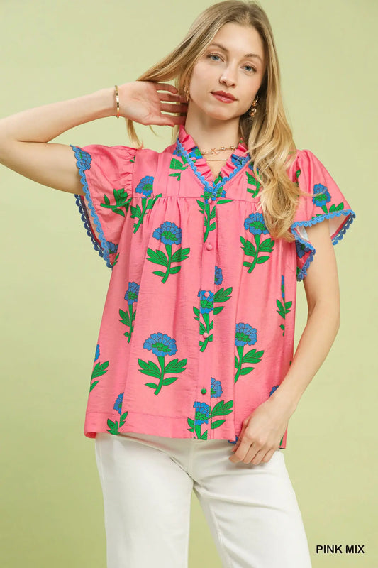 Floral Button Front Ruffle Sleeve Top in pink with blue and green floral patterns, ruffle sleeves. Available in sizes XS-XL.