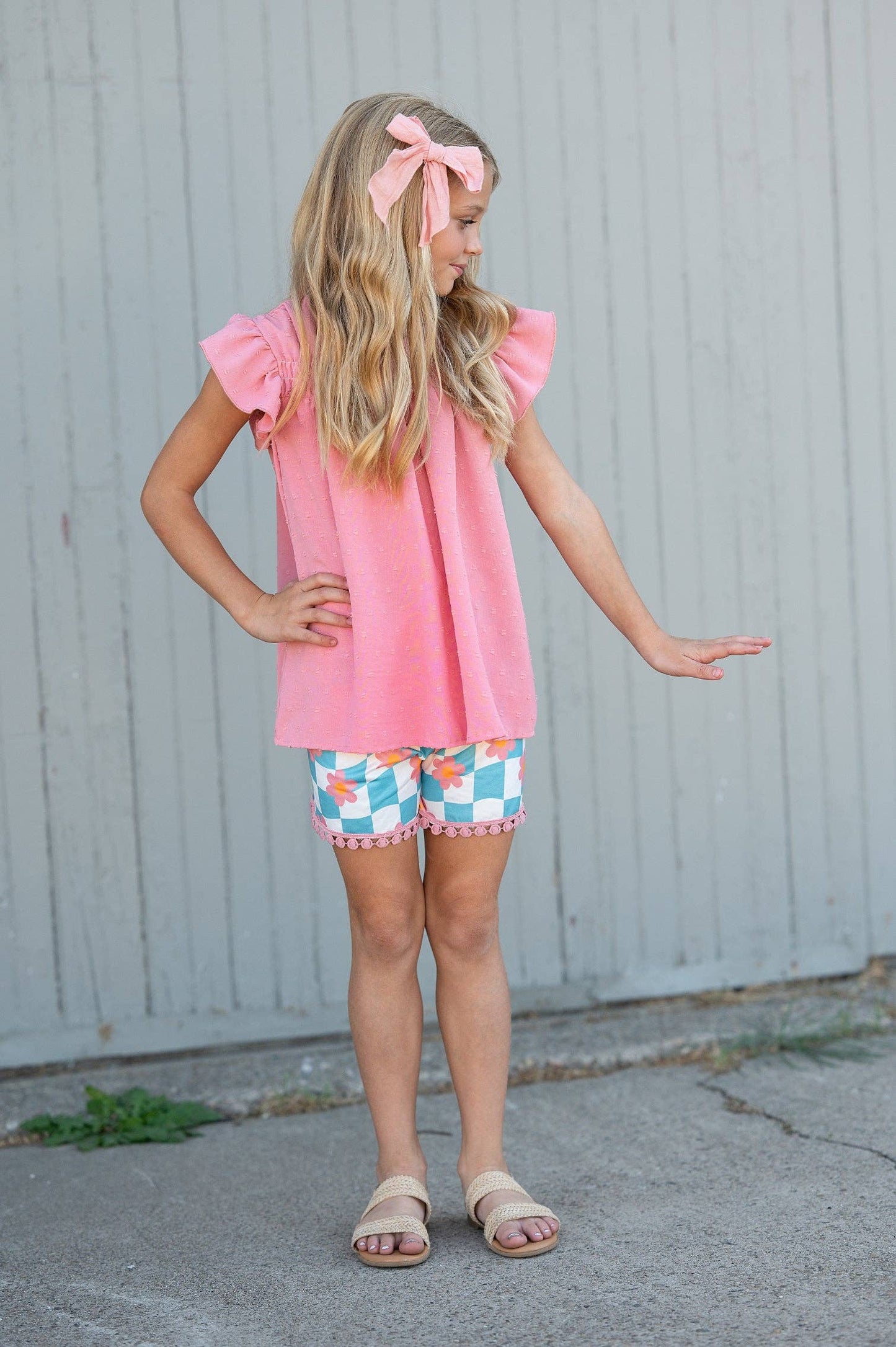 Girls Teal Check Wave Short Set, available in sizes 2T-10Y. Features teal check pattern and comfortable fit.