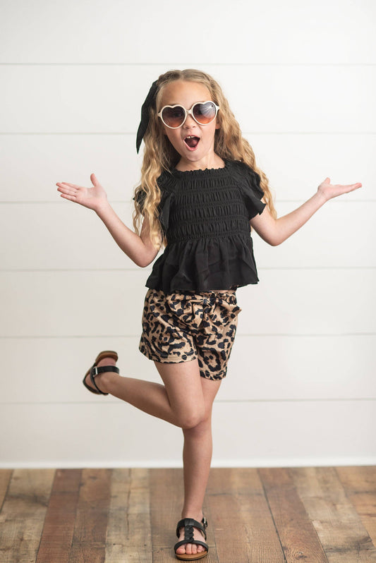 Girls Leopard Shirred Short Set with black top and leopard print shorts. Available in sizes 4-10.