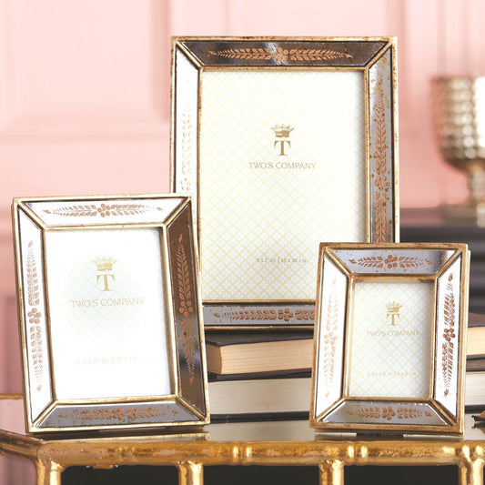 Three Verona Gold Leaf Mirror Photo Frames with intricate patterns and gold edges. Sizes: Small, Medium, Large.