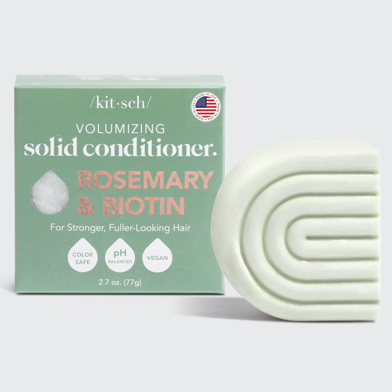 Light green, arch-shaped vegan conditioner bar from Kitsch; available in multiple sizes; color-safe, pH-balanced formula.