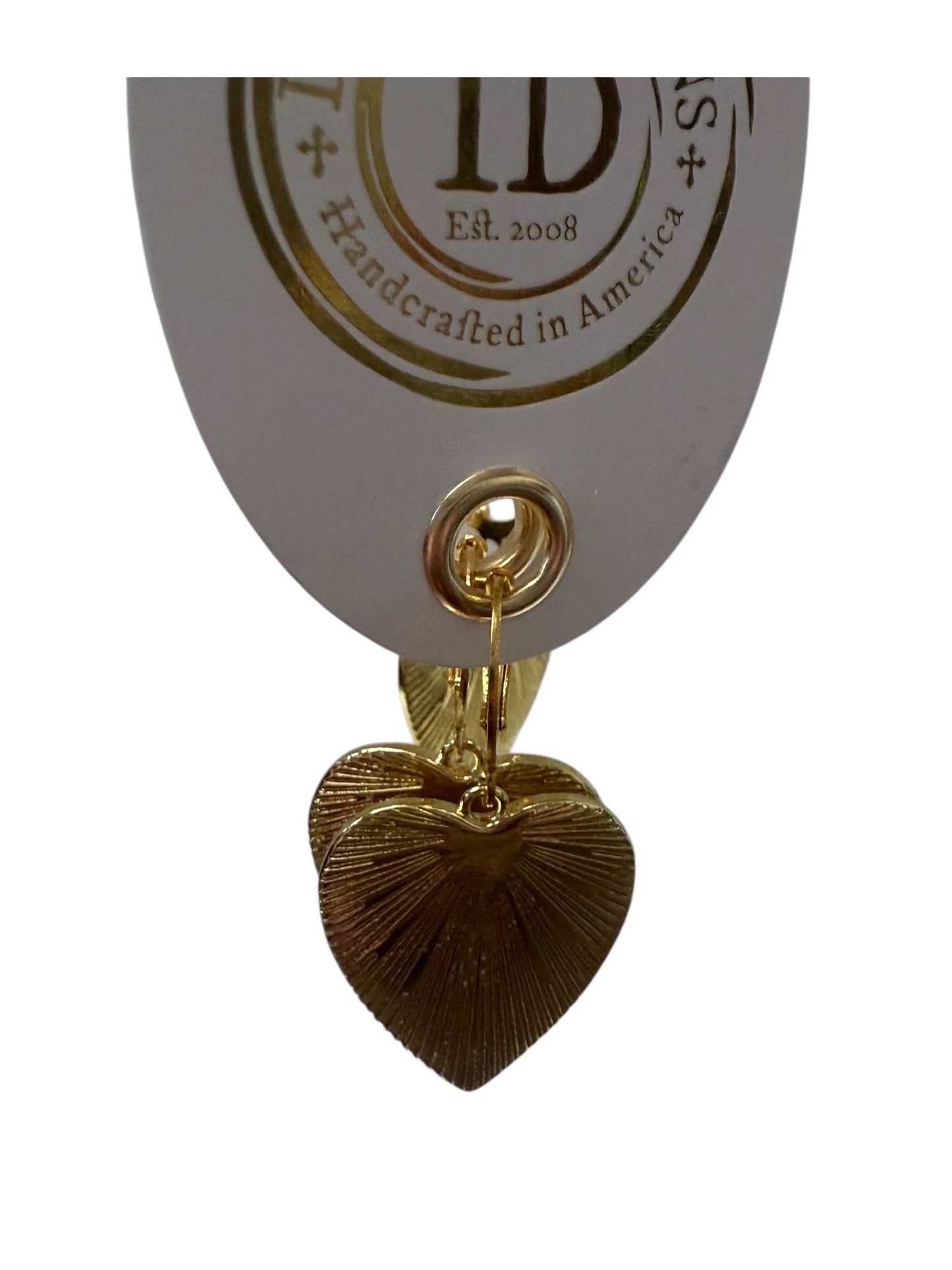 Gold heart-shaped earrings with a textured ray pattern. Sizes available: small, medium, large.