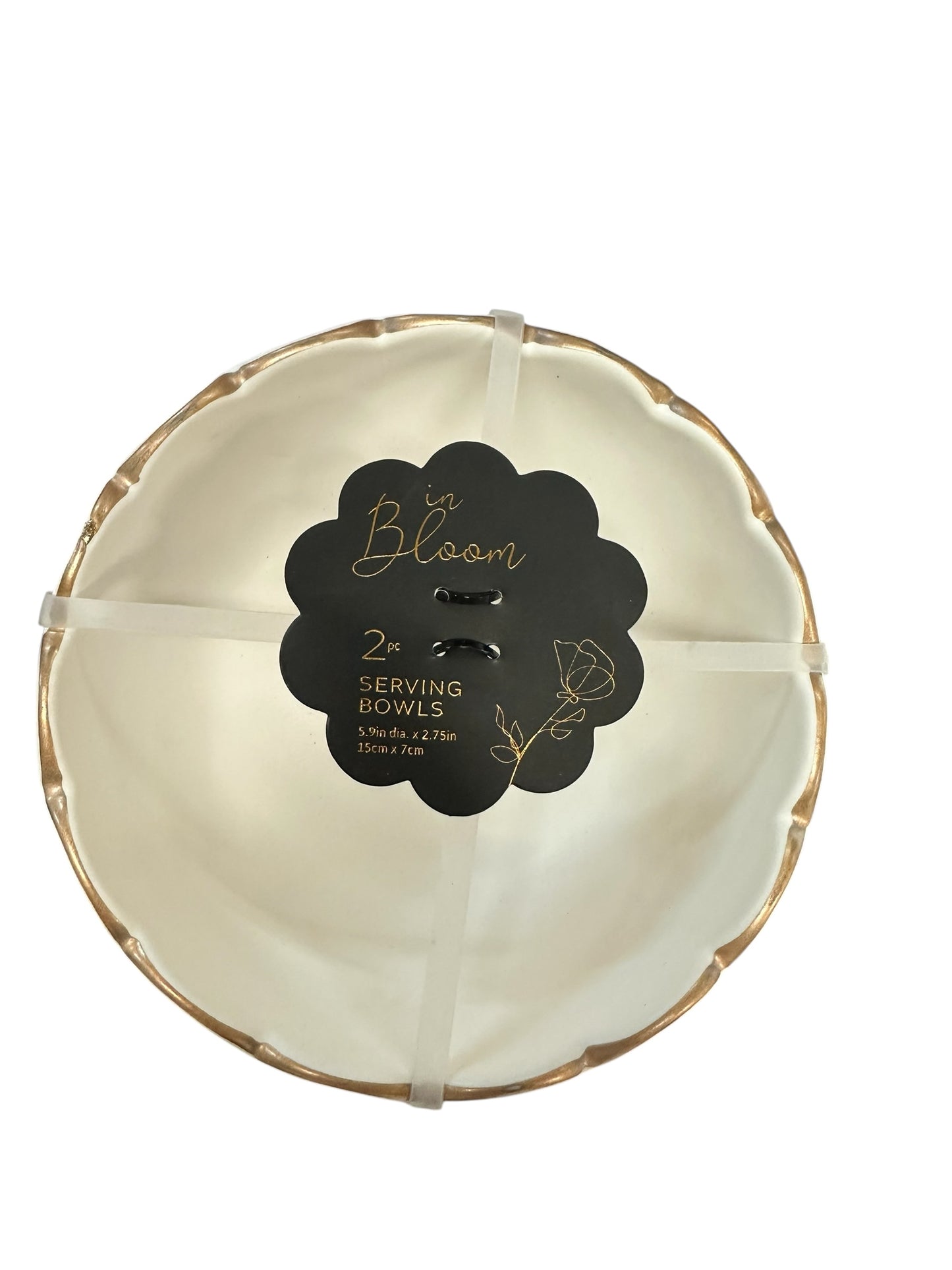 Set of two white ceramic bowls with gold rims, 9 in/22.5 cm, stacked together and secured with white bands.