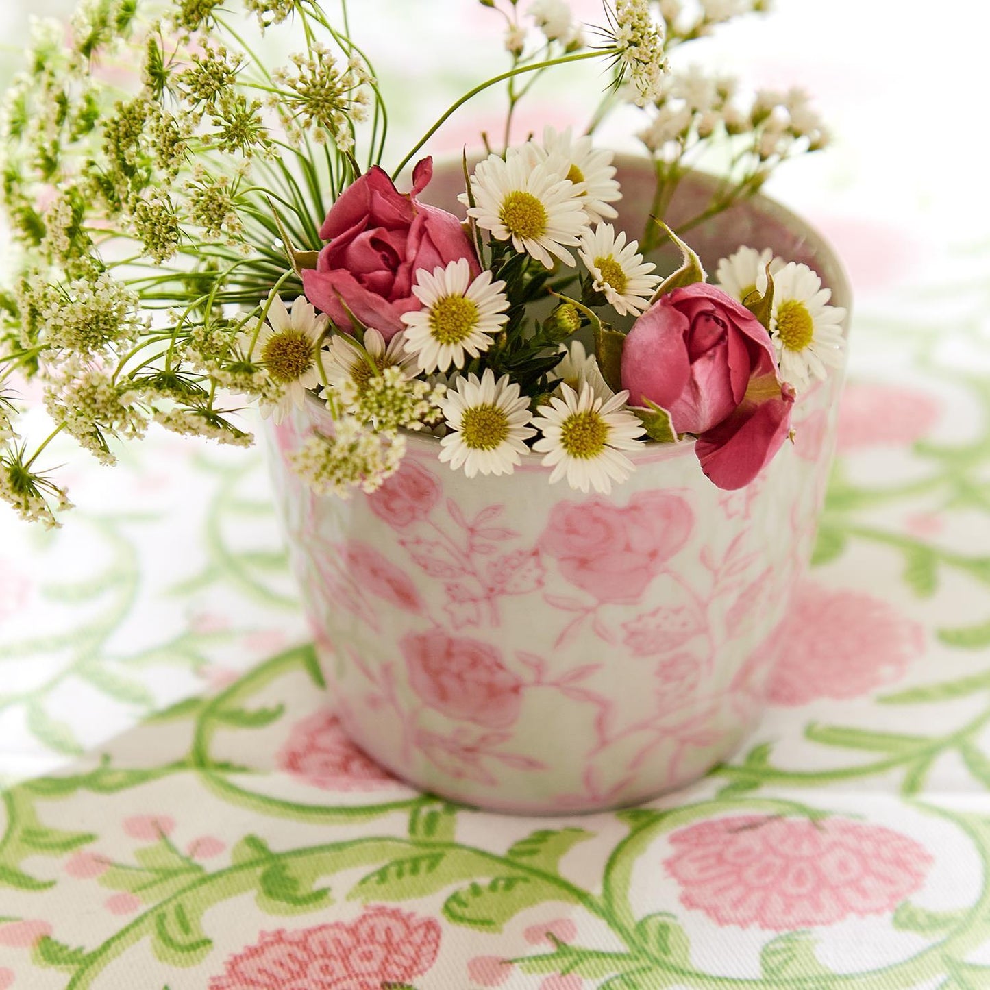 Pink Chinoiserie Cachepot, hand-painted with floral designs. Available in small, medium, and large sizes.
