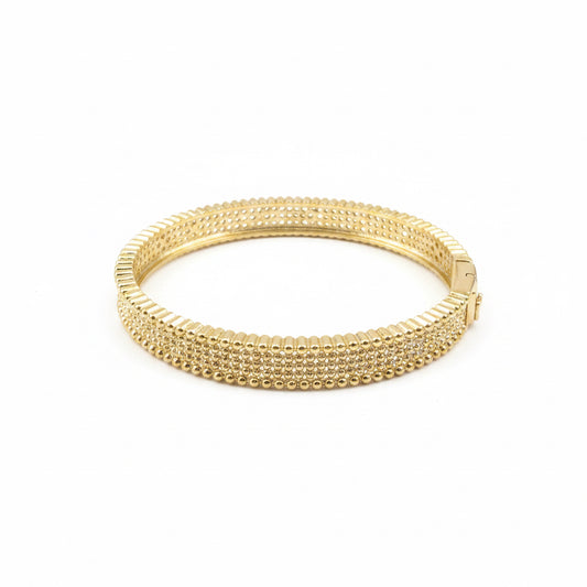 The Golden Hour Bangle: gold stacking bracelet with textured beaded design and clasp. Available in S, M, and L.