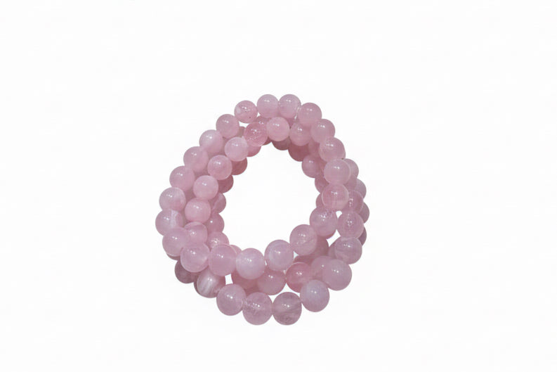 Two Strand Pink Stone Stretch Bracelets with round light pink beads. Available sizes: S, M, L.