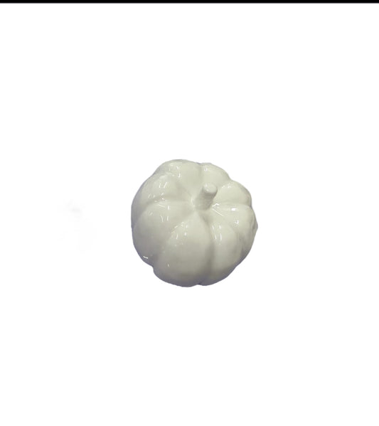 Small, glossy white porcelain pumpkin available in three sizes.