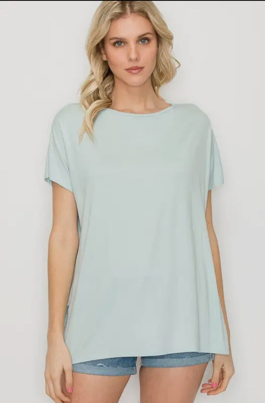 The Perfect Shirt: light blue rayon blend, comfortable fit, available in sizes XS–XL.