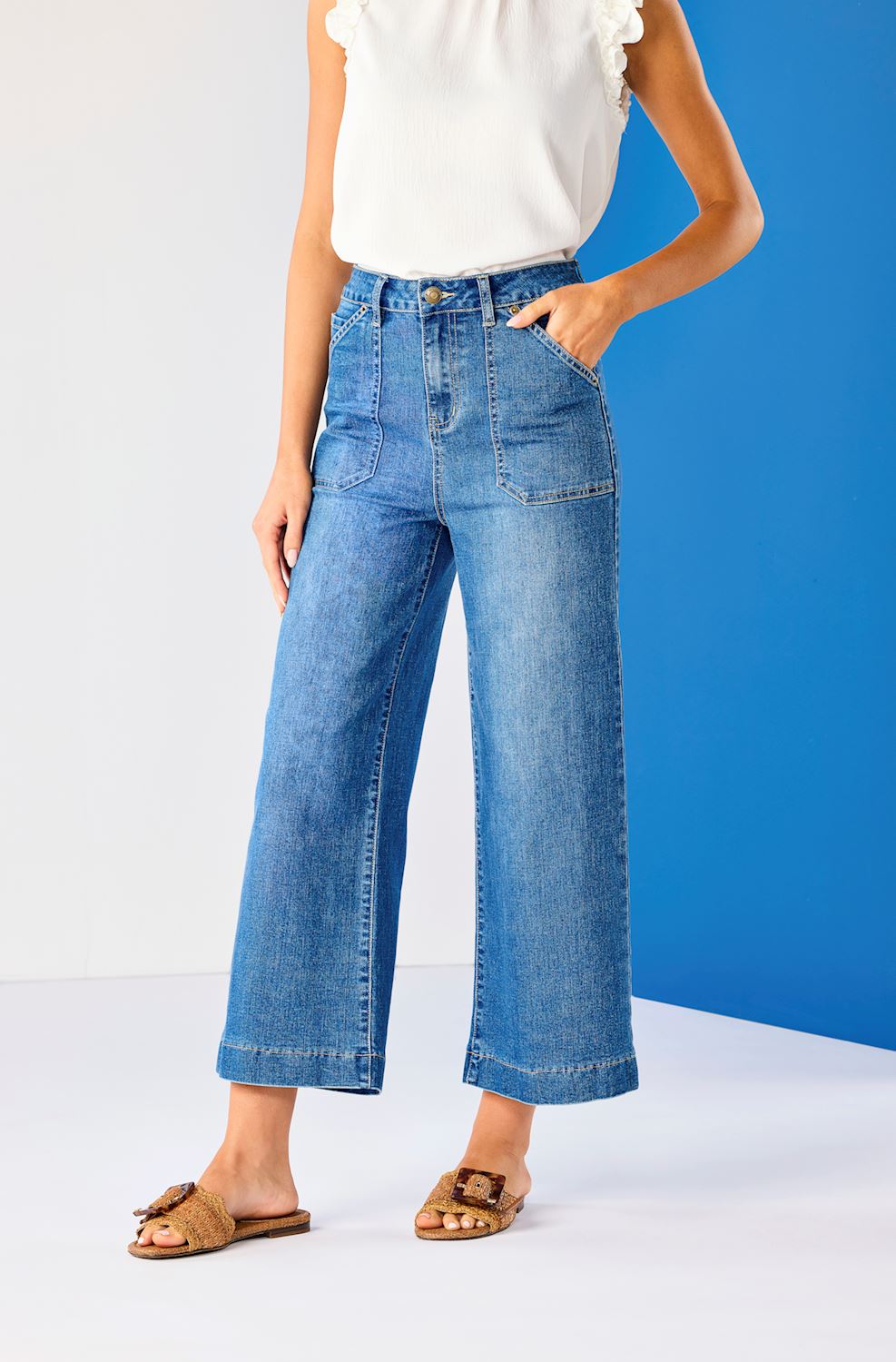 Fritz Cropped Wide Leg Jeans feature oversized front pockets and a casual, relaxed fit. Available sizes: 24-32.