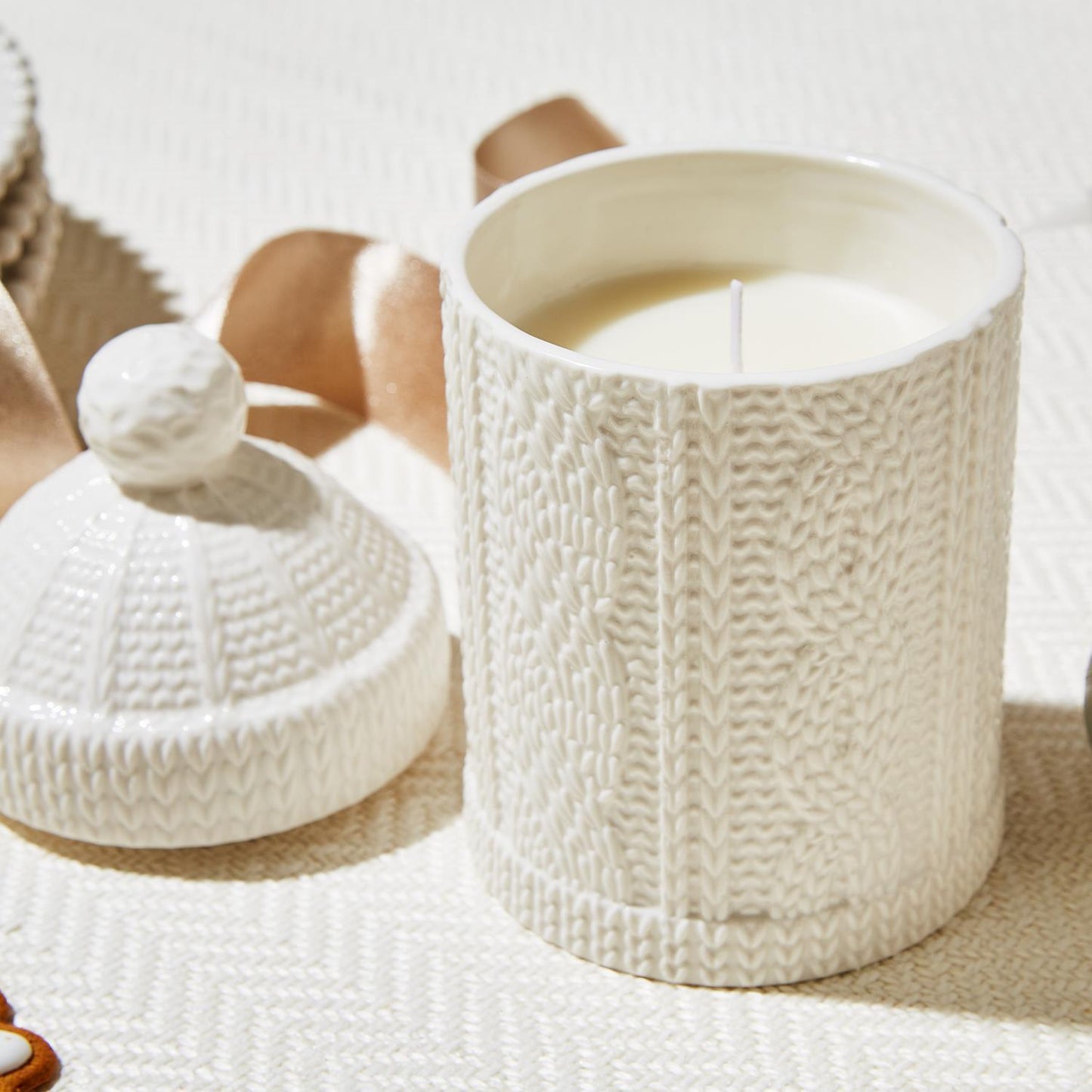 Ceramic cable knit candle with beanie lid, Fraser fir scent, in gift box. Available in 8oz and 16oz sizes.