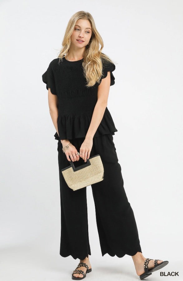 Scallop Wide Leg Pants with elastic waistband, wide-leg silhouette, and scalloped hems. Available in sizes XS-XL.