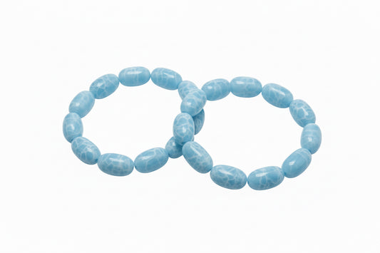 Light blue oval marble-patterned stone stretch bracelets. Available in sizes S, M, and L.
