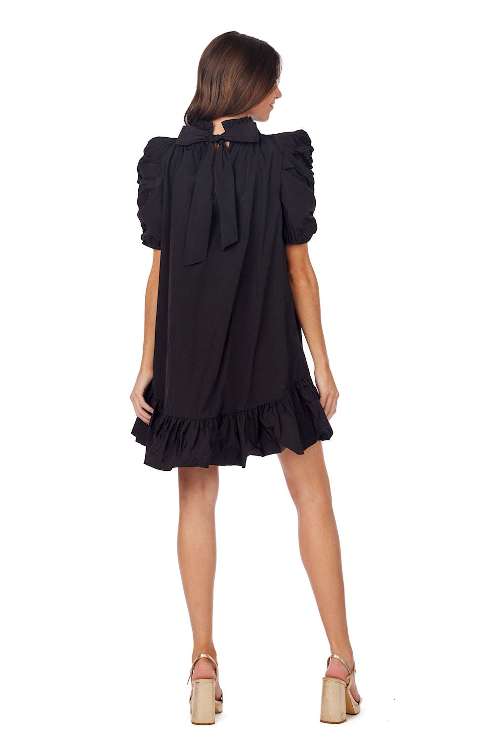 Black Roosevelt Party Dress with puff sleeves, ruffled hem, and back bow. Available in XS-XL.