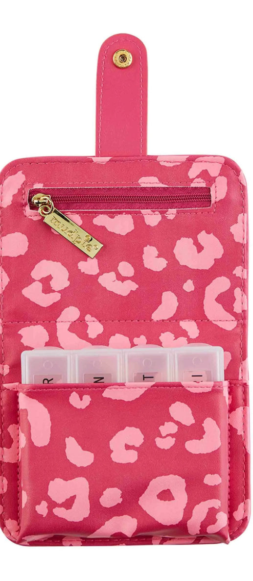 Pink leopard print travel pill organizer with gold zipper charm, snap strap, weekly labeled compartments. Sizes: S, M, L.