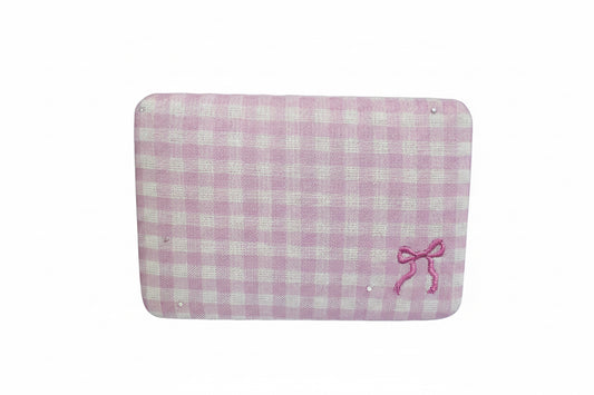 Rectangular light pink gingham jewelry case with small pink embroidered bow. Available in small and large sizes.