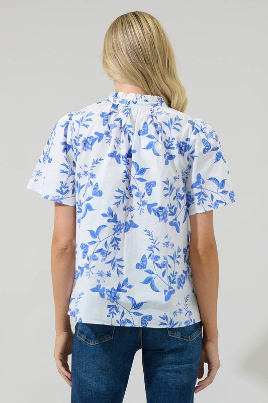 Leya Floral Inaya Split Neck Top with blue, white, and butterfly patterns. Available in sizes XS–XL.