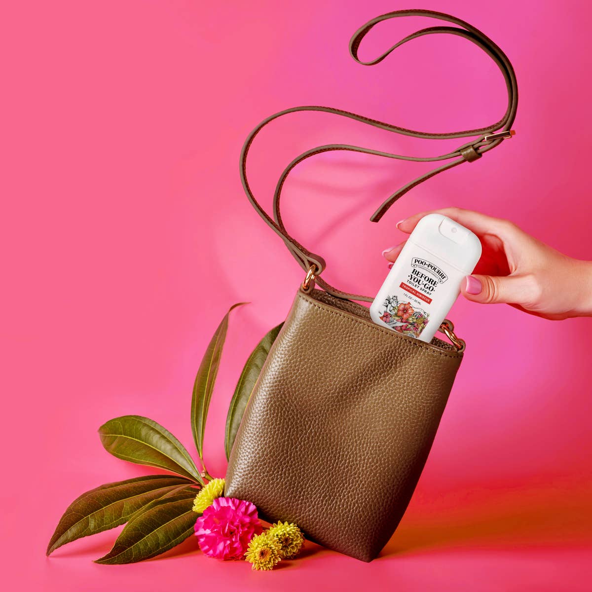 Love Beauty and Planet" white lotion bottle, available in multiple sizes, shown being placed into a small brown purse.