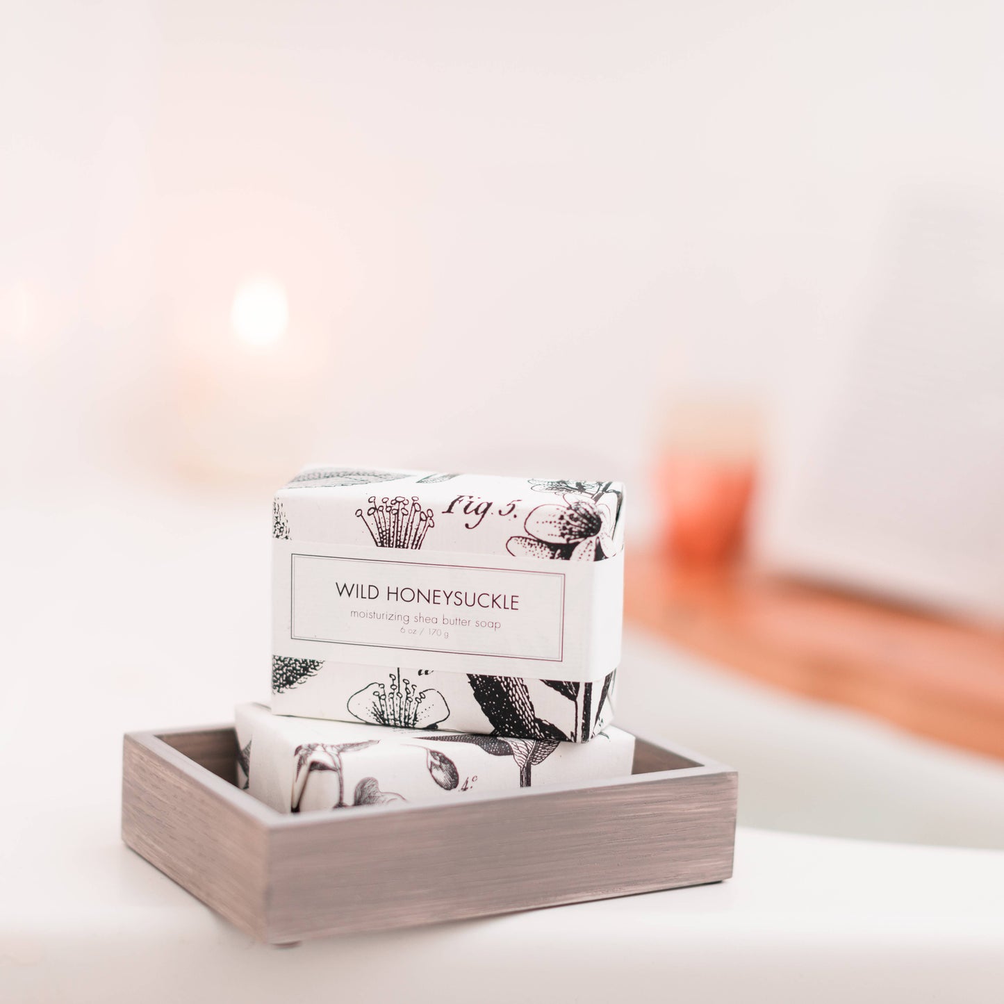 Two Wild Honeysuckle Soap - Bath Bars ideal for daily use. Features a floral scent and a nourishing formula. Accompanied by decorative floral packaging. No other products included, soap bars exclusively offered. Available in one standard size.