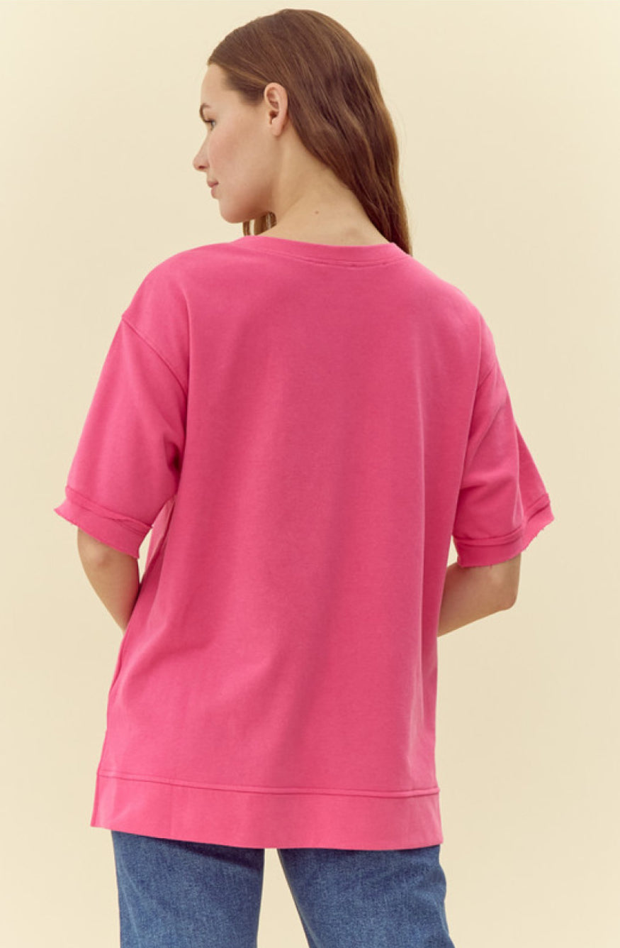 Pink Ribbon Shirt with U-neck and short sleeves. Sizes: XS, S, M, L, XL.