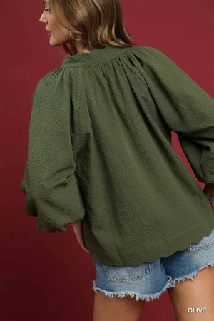 Olive green scallop hem balloon sleeve top, available in sizes XS-XL.