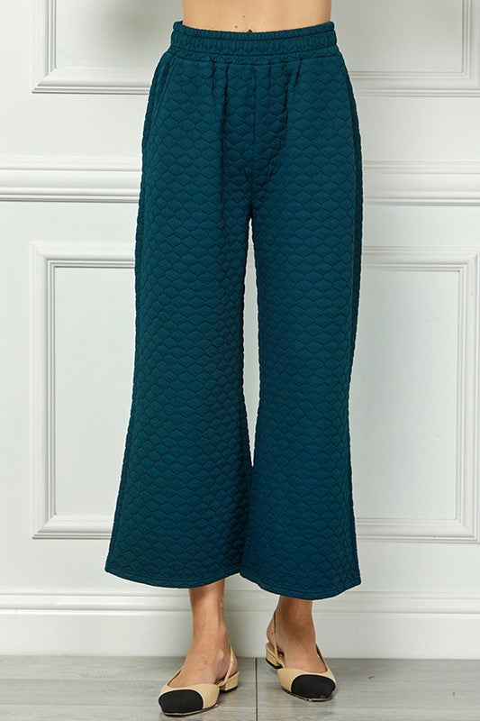 Teal quilted wide-leg pants from the Honey Comb Textured Set, available in sizes XS-XL.