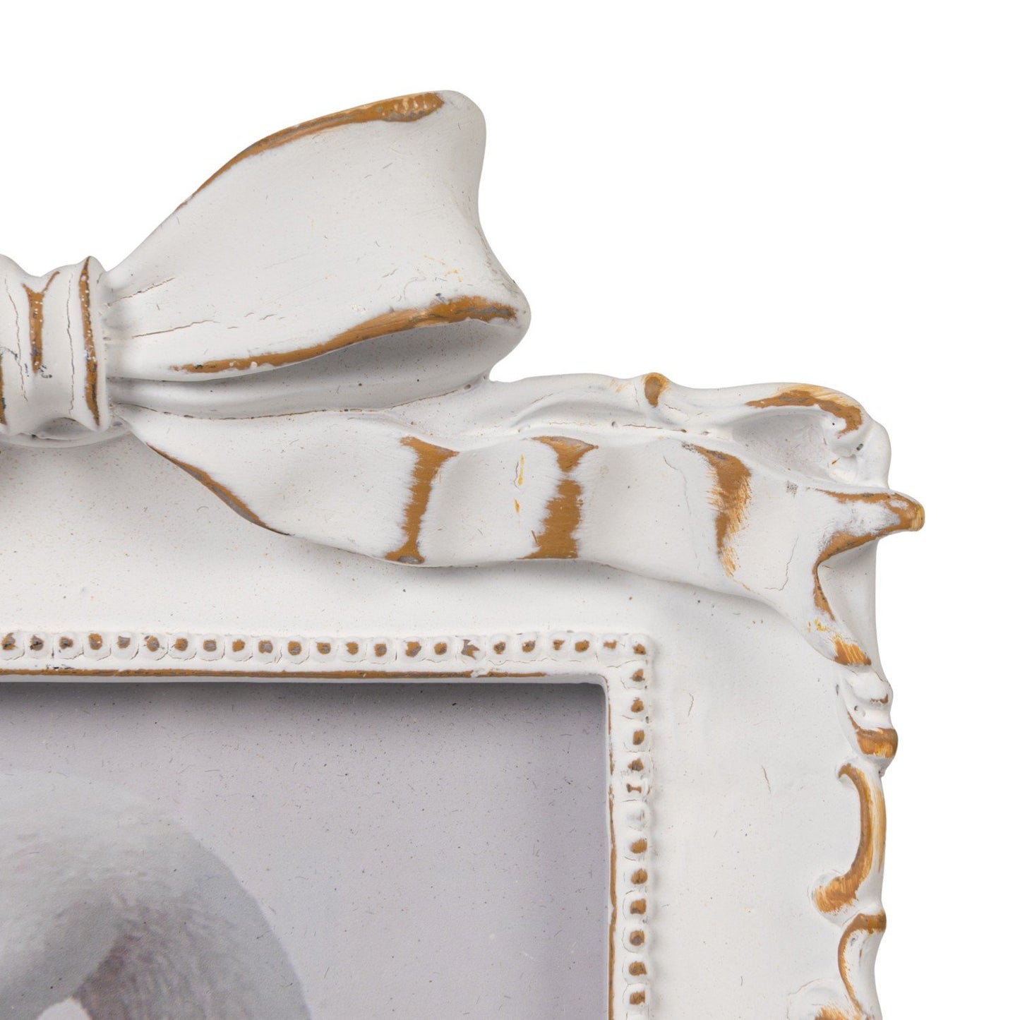 Plastic photo frame with ornate details, large top bow, gold accents; vintage style. Fits 4x6 photos.