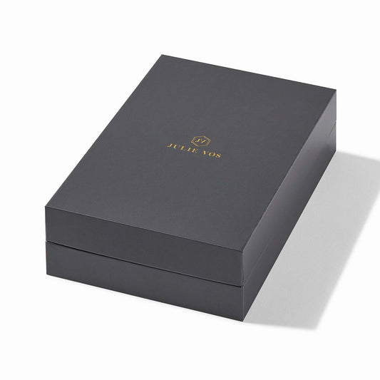 Closed dark gray "JULIE VOS" gift box with gold logo. Contains Honeybee Dem Necklace Iridescent Clear. Sizes: S, M, L.