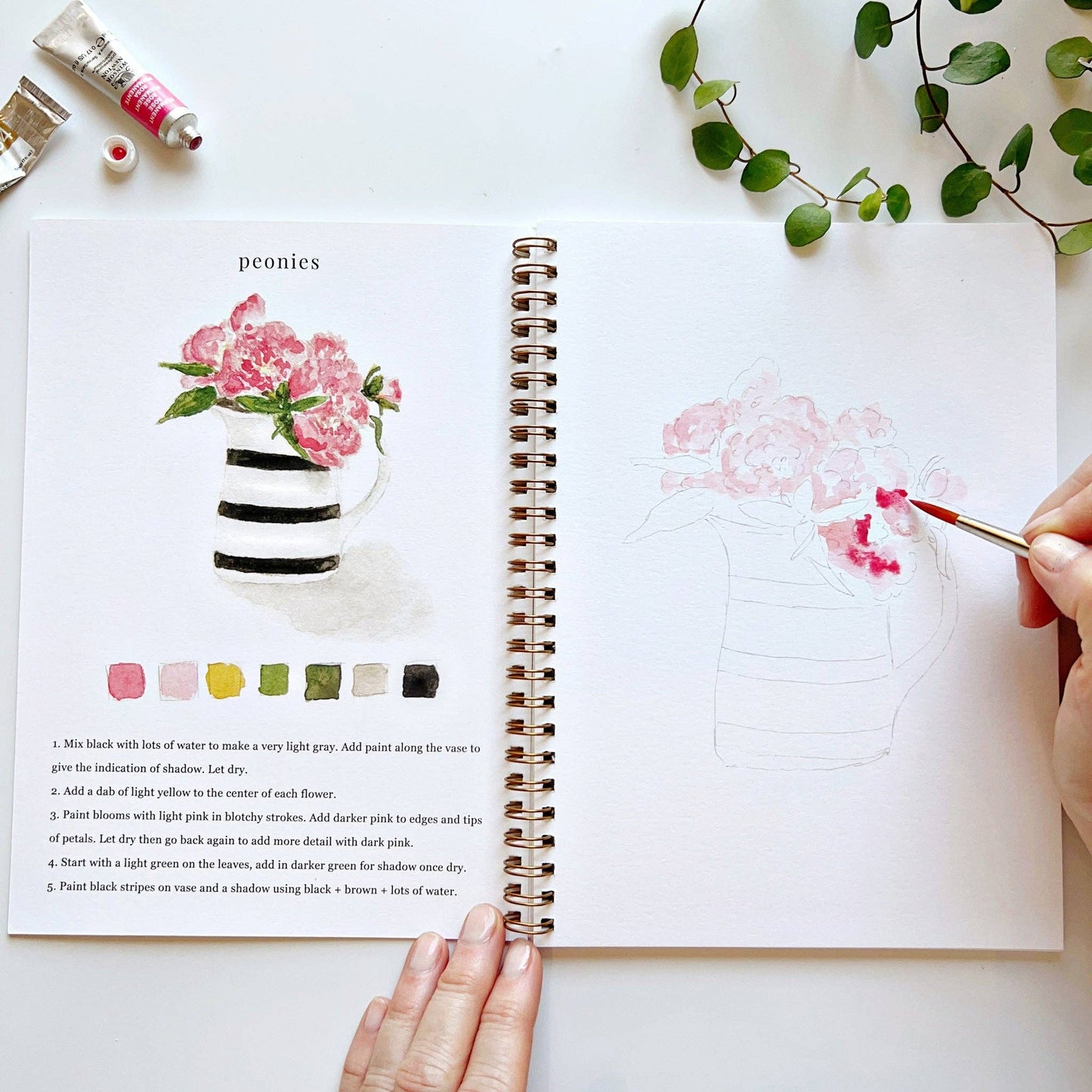 The Bouquets Watercolor Workbook offers beginner peony painting guides and floral illustrations. Available in standard workbook size.