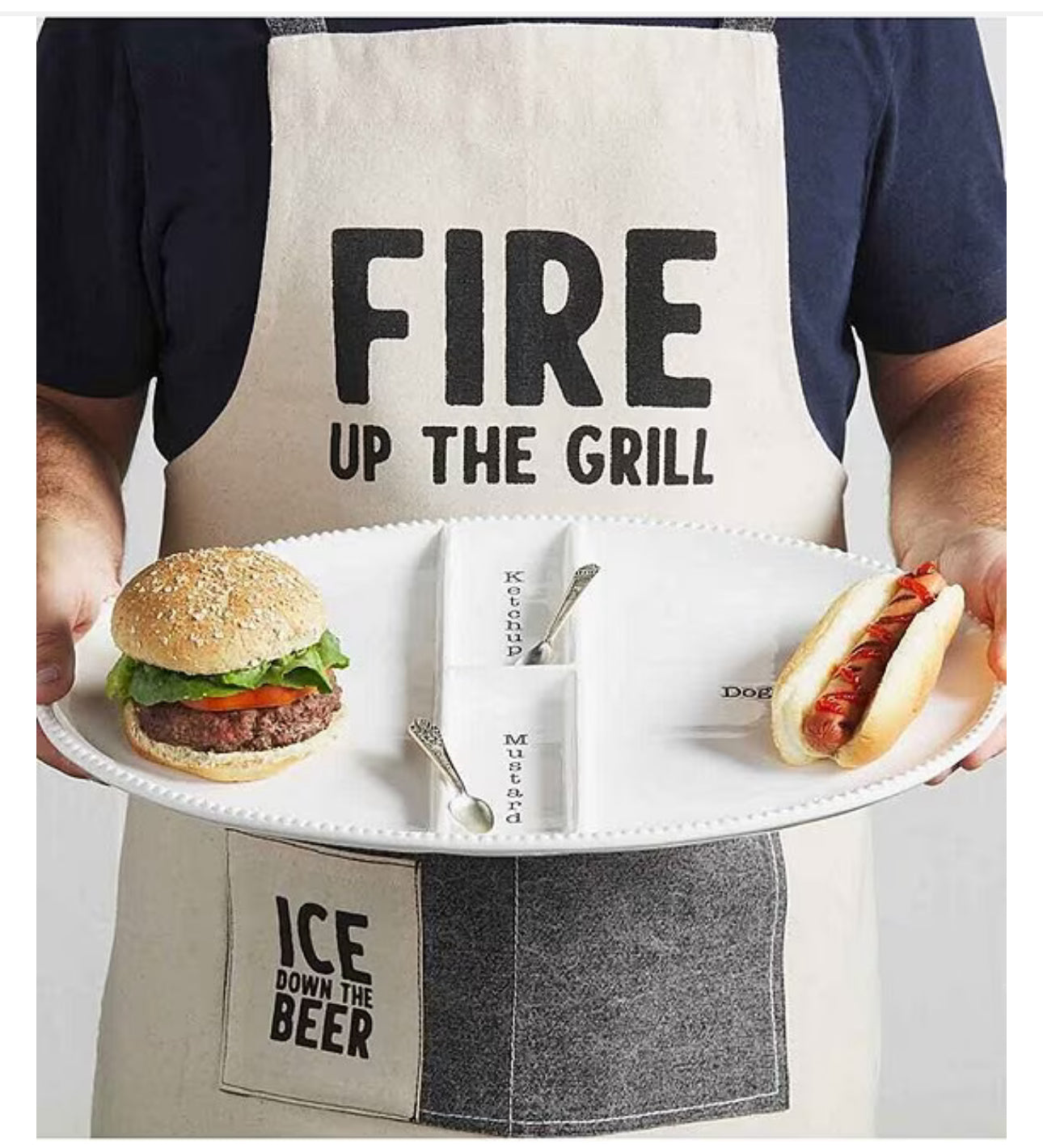 Fire Up The Grill Apron with "FIRE UP THE GRILL" on front, "ICE DOWN THE BEER" on pocket. Available in S, M, L, XL.