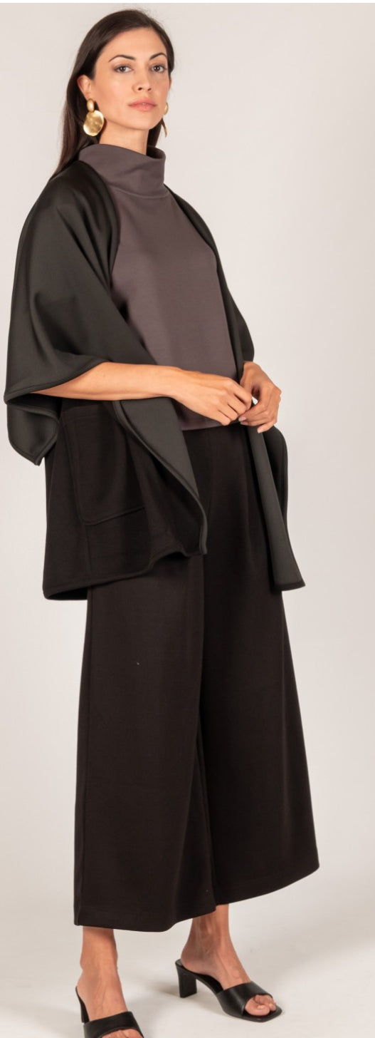 **Butter Modal Cape Cardigan**
- Color: Dark Gray
- Style: Open-front, flowing
- Material: Butter Modal
- Neckline: High-neck top (underneath)
- Sizes Available: S, M, L, XL