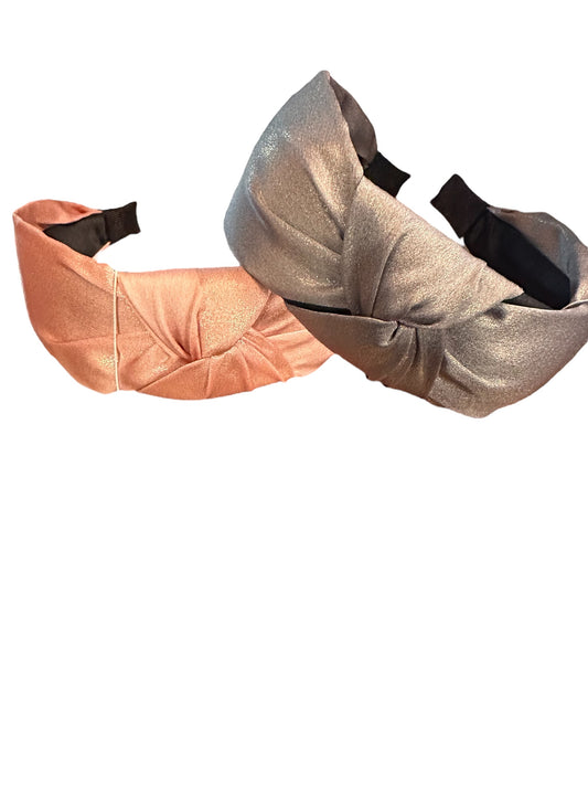 Shimmery pink and silver silk headbands with black elastic backs. Available in S, M, L sizes.