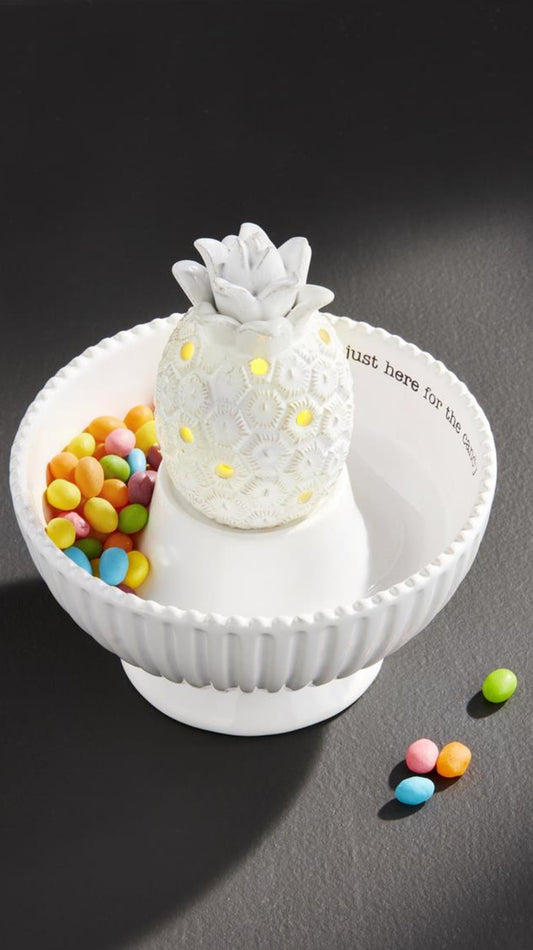 White dolomite pedestal candy dish with raised pineapple and yellow lights, 3 1/2" x 6 3/4". Interior text partly visible.