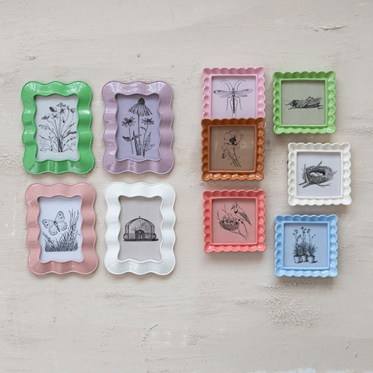 Set of nine pastel resin photo frames, wavy design, 4x6 size.