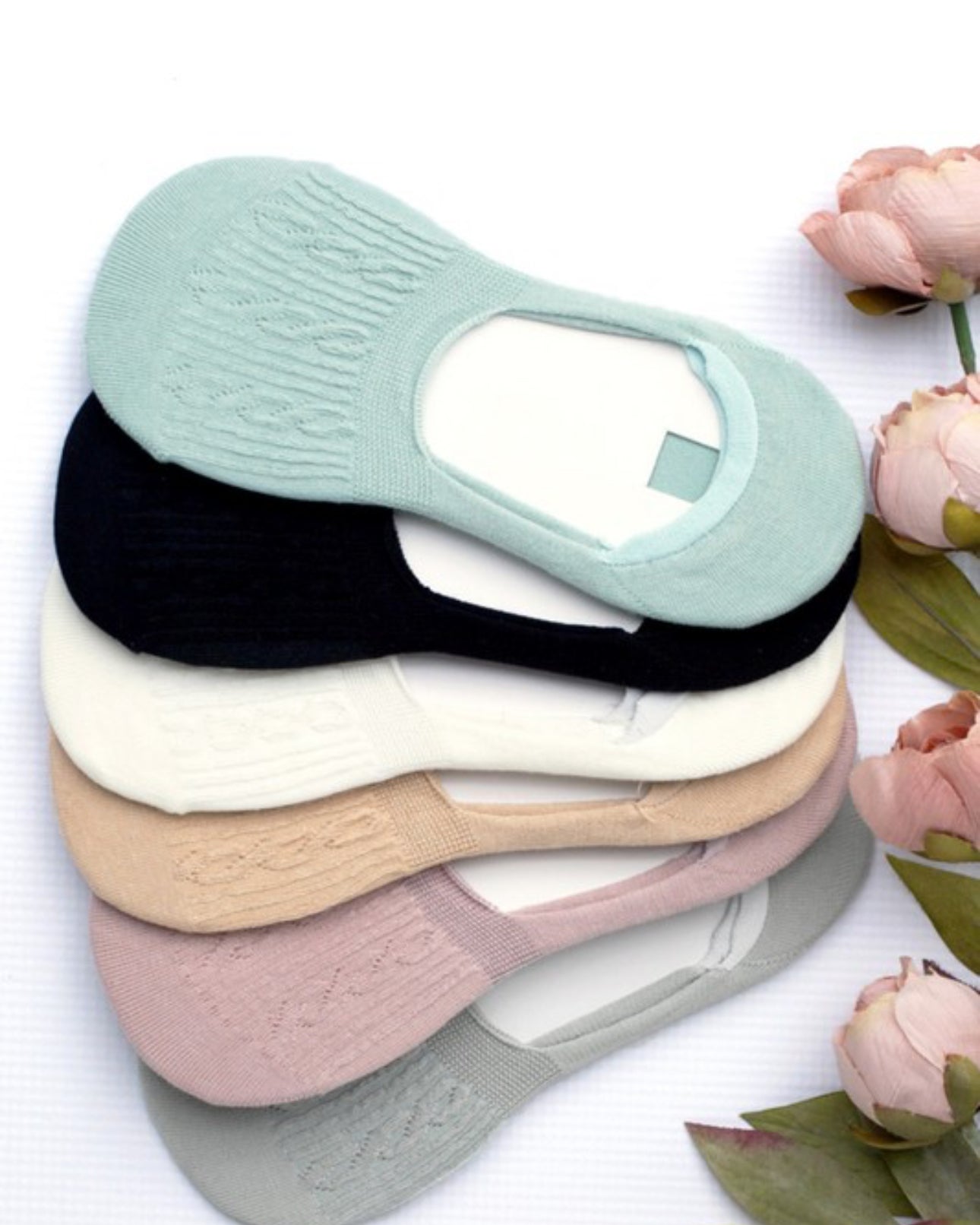 Six pairs of No Slip Sneaker Socks—Cable Knit, pastel/neutral shades, available in S/M/L.