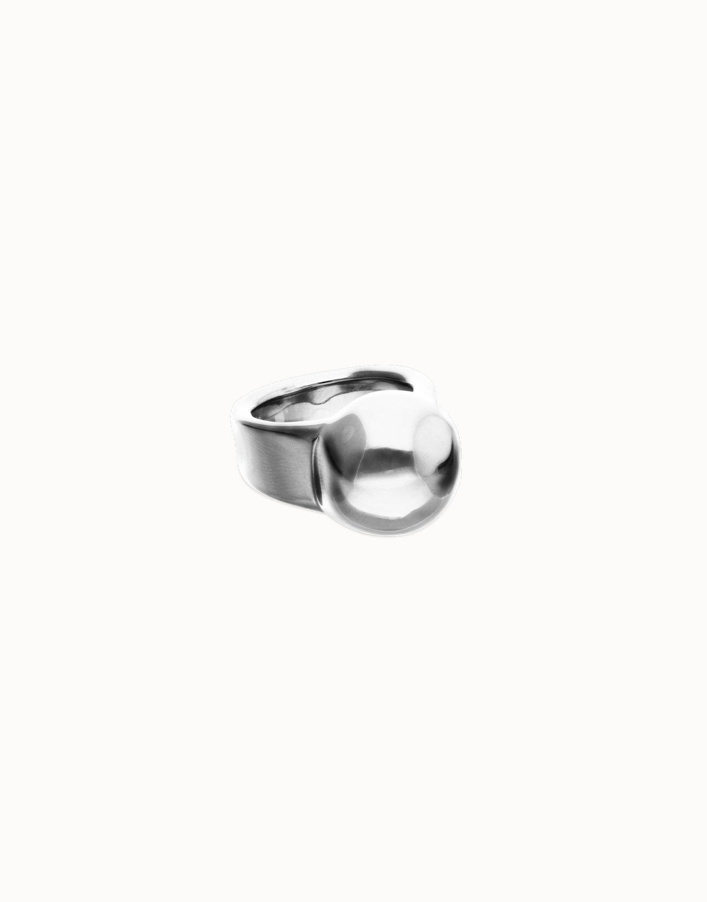 Sterling silver ring with a wide band and large, smooth sphere on top; available in sizes 6–9.