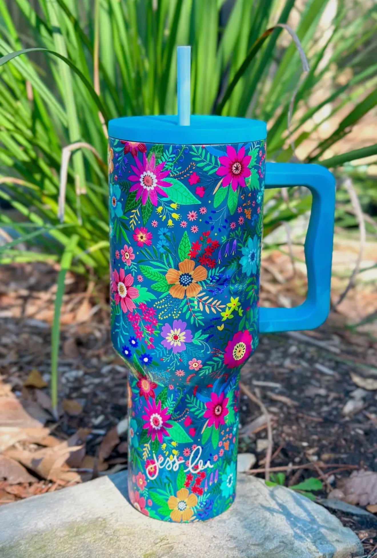 Mystic Fields Floral Tumbler, 40oz blue with handle and straw, features floral design and "Jess Lee" in stylish lettering.