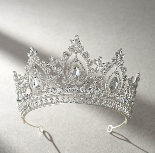The Queen Crown: Austrian crystal tiara with intricate patterns, large teardrop gemstones. Available in S, M, and L.
