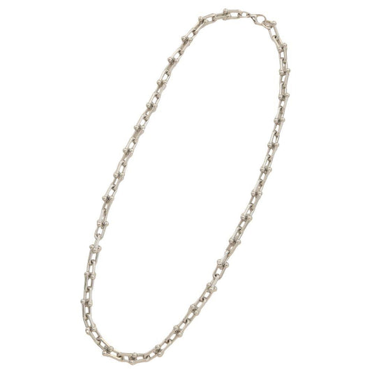 Gold-dipped necklace with elongated rectangular and small round links, available in 18-inch length.