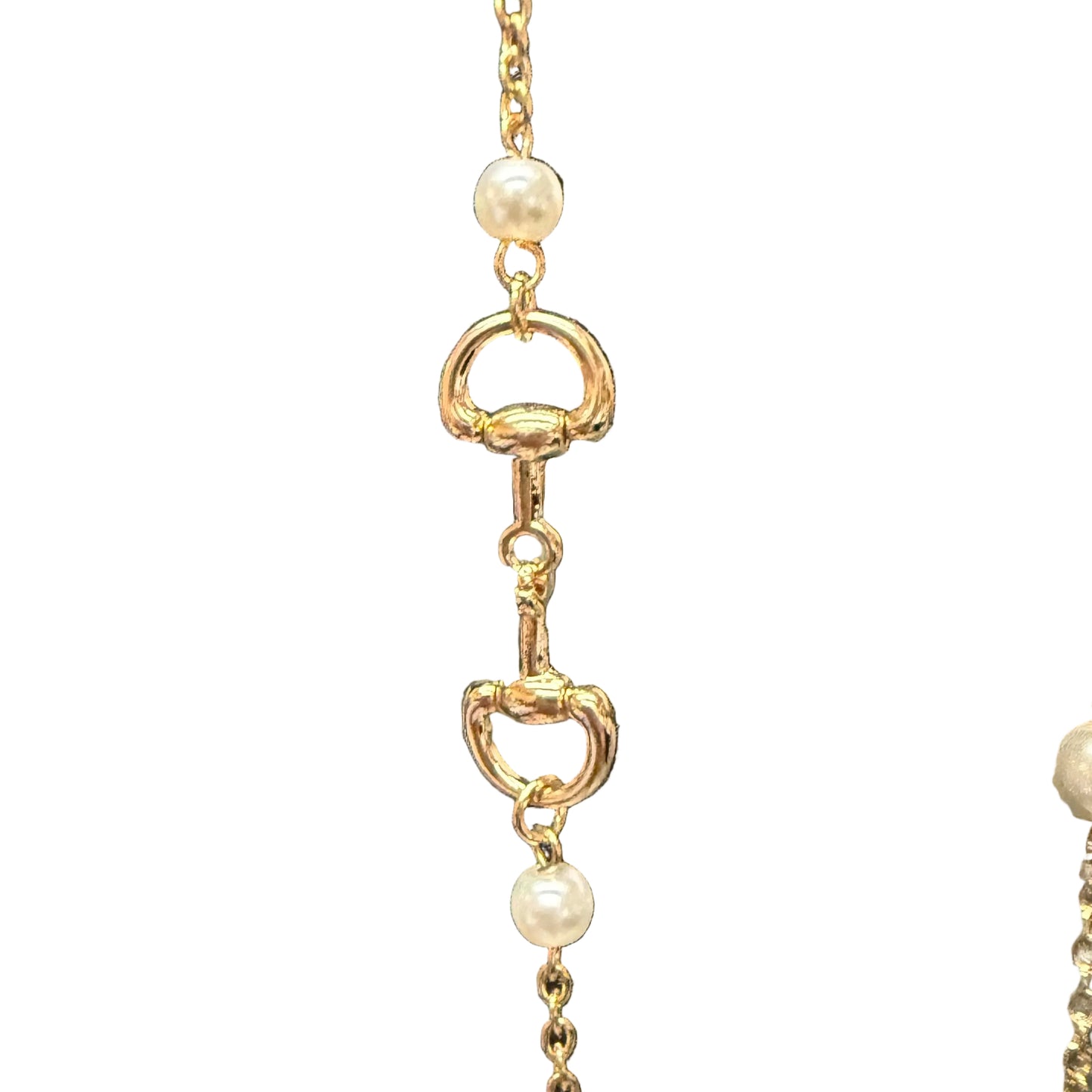 Candy Gold Pearl Necklace with delicate white pearls and gold horse-bit accents. Available in 16", 18", and 20" lengths.