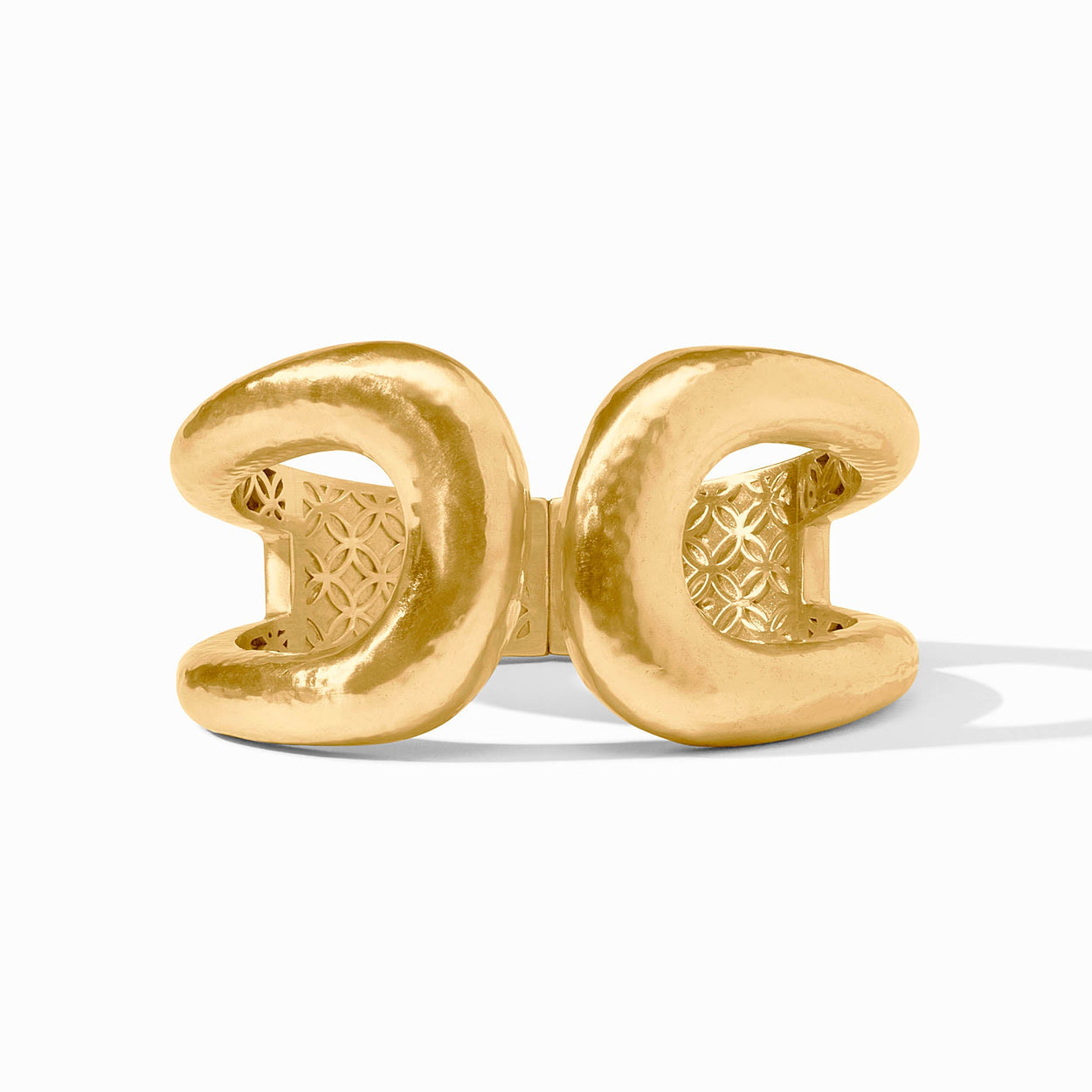 Chunky 24K gold cuff with two rounded crescents, joined by a hinged patterned detail. Available in S, M, and L.