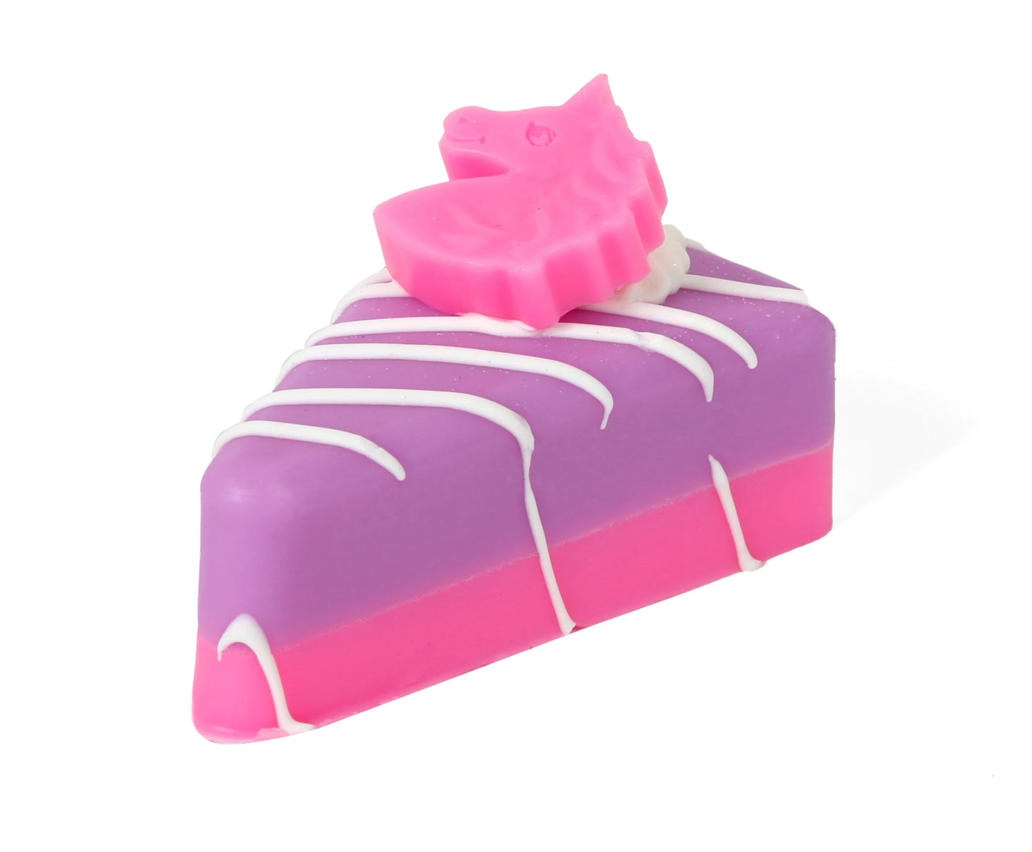 Cake-shaped pie soaps with pink and purple layers, white drizzle, pink unicorn top; available in multiple sizes.
