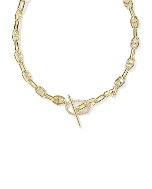 Gold necklace with oval links, a toggle clasp, loop accented by small white stones. Available in multiple sizes.